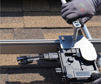 Microinverter being installed