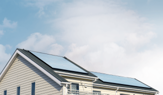 Modern house with solar panels on the roof