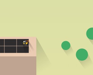 Green and yellow building with window, bird perched on ledge.