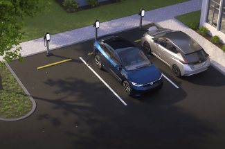 Electric vehicles being charged in an urban parking lot