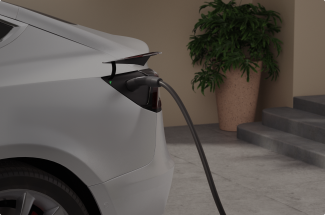  Electric vehicle plugged into EV charger.