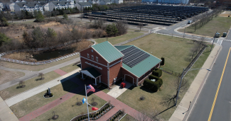 Exterior view of the non-profit museum in New York with solar panels installed on the roof