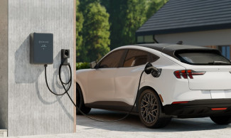 Electric vehicle plugged into Enphase IQ EV Charger 2