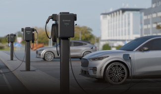 Cars getting charged at EV stations
