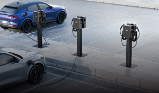 Cars getting charged at EV stations