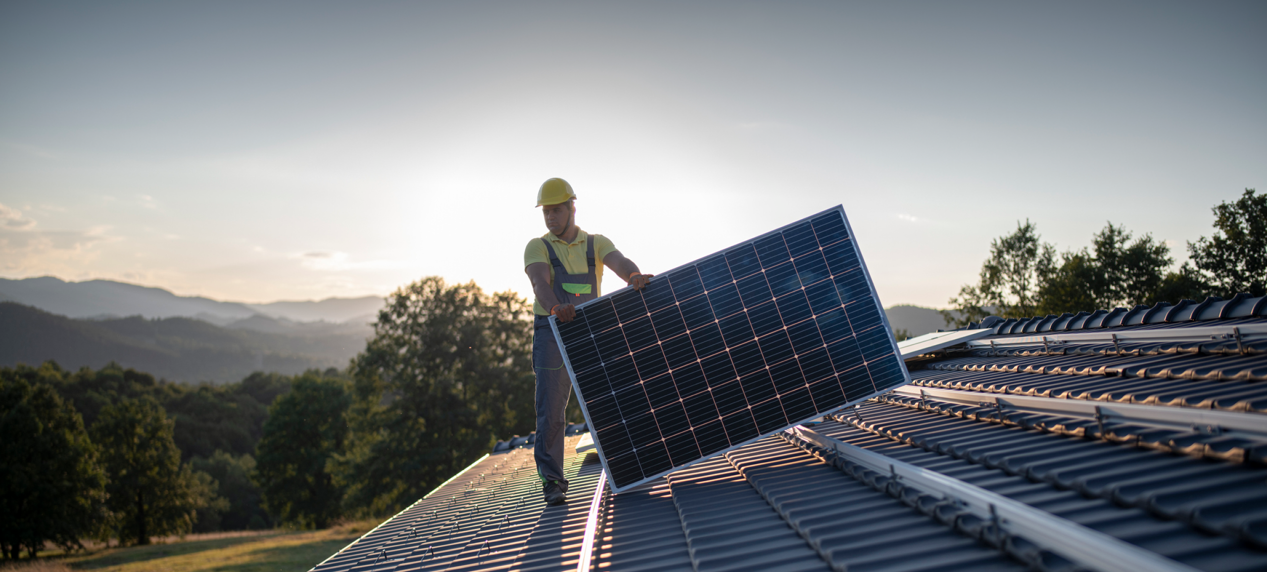 Installer on solar roof